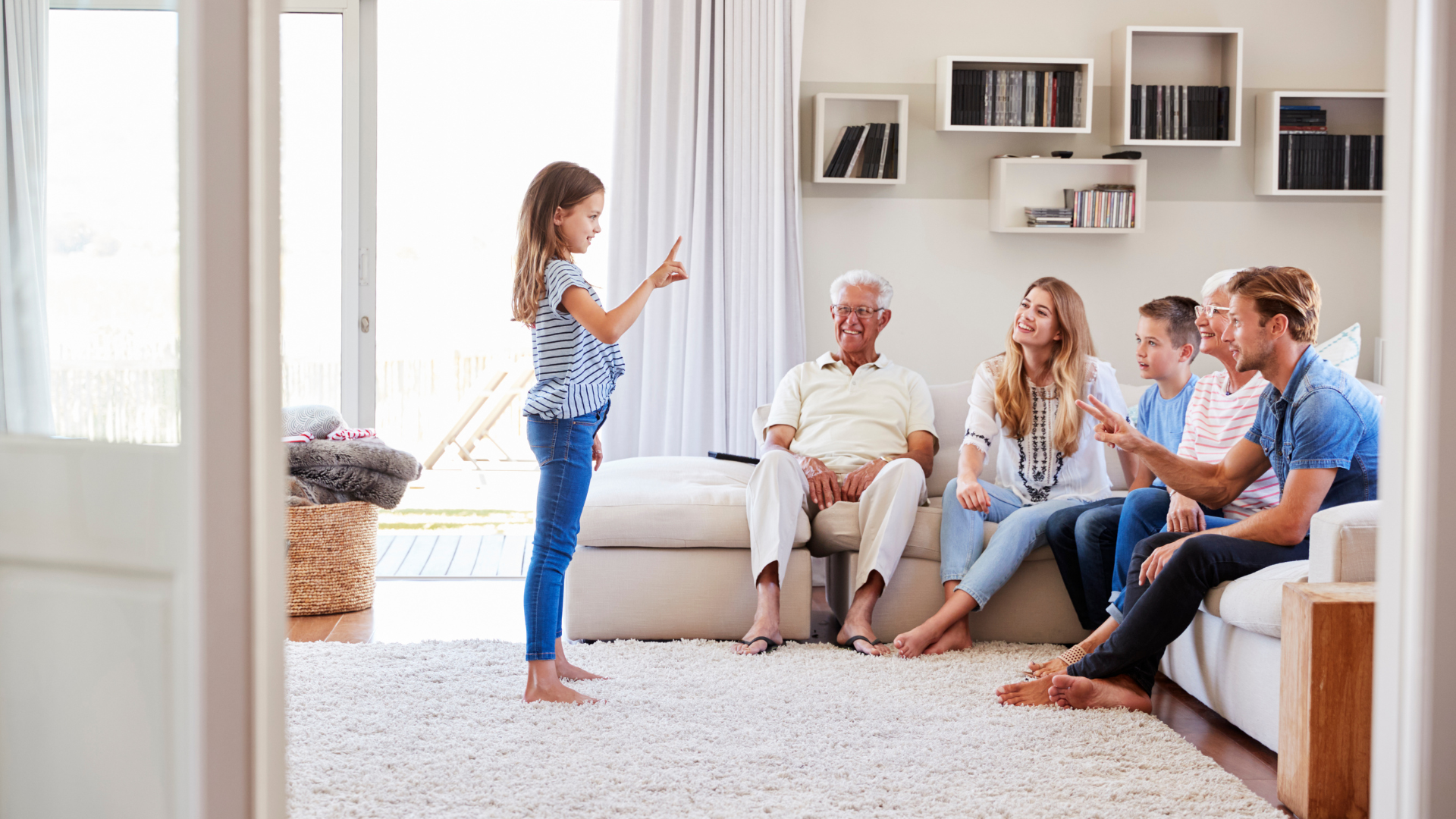 Multi-generational family in modern living room